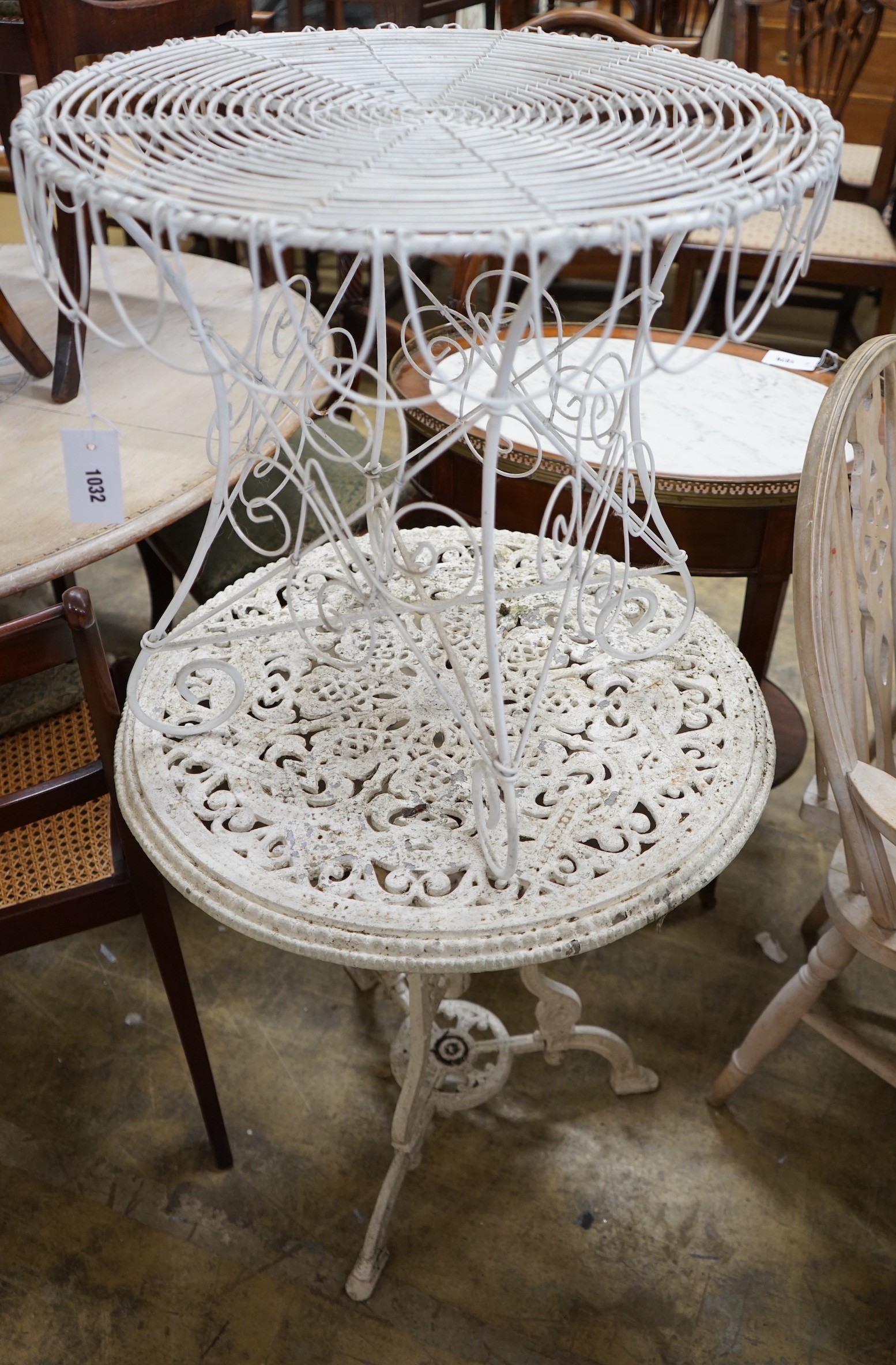 A painted wirework circular garden table and a painted aluminium garden table, larger diameter 60cm, height 70cm